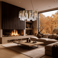 Aurora Sublime chandelier illuminating a contemporary living room with brass accents and flowing Murano-style glass panels.