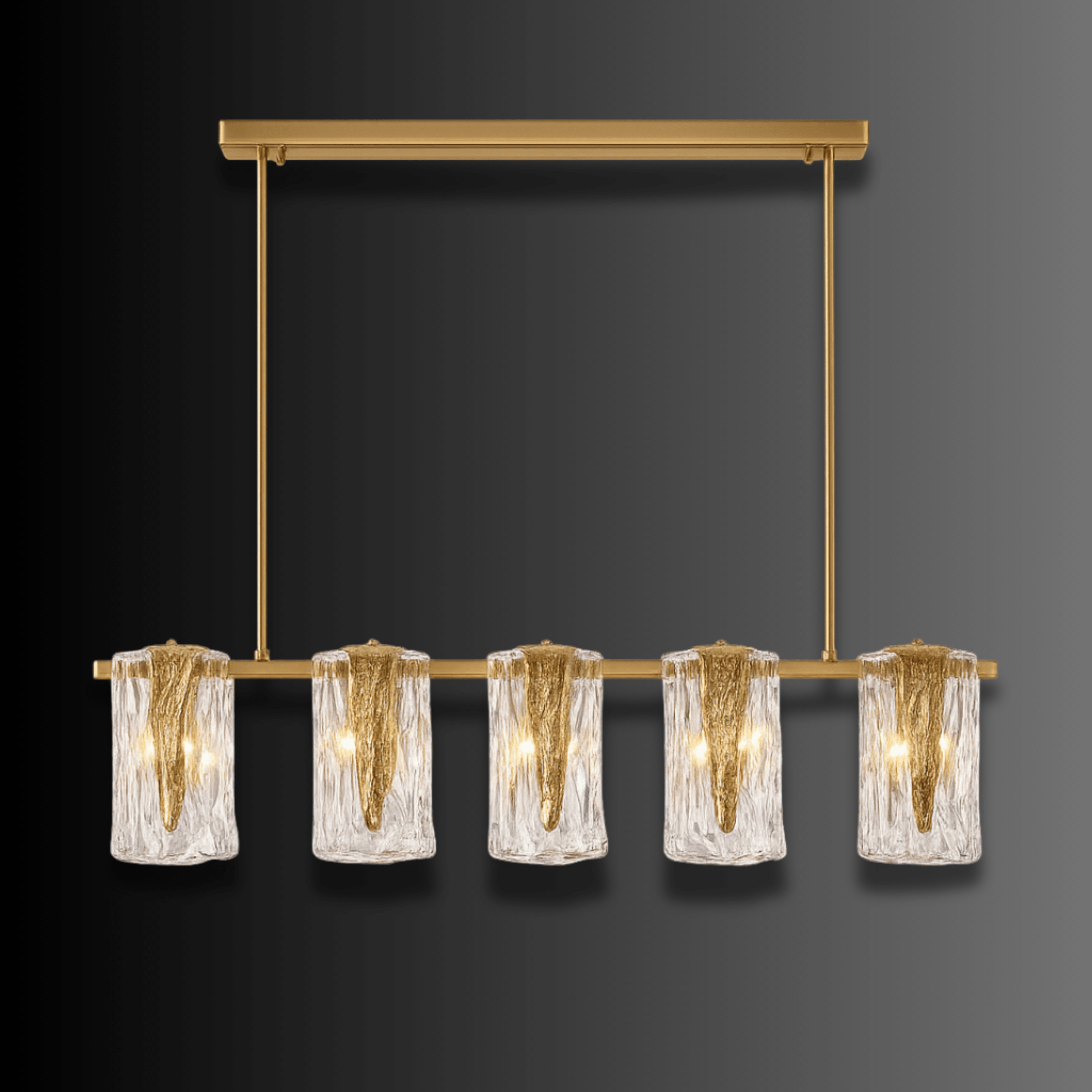Aurora Vellum chandelier against dark background, showcasing brass frame and vellum-like Murano-style glass folds.