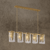 Luxury Aurora Vellum linear chandelier in brass with Murano-style folded glass shades, shown in a front studio view.