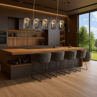 Aurora Vellum chandelier installed above a kitchen island, featuring brass bar and hand-shaped Murano-style glass.
