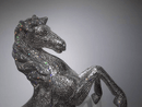 Detailed view of AZAR crystal horse head highlighting precision-cut crystal placement