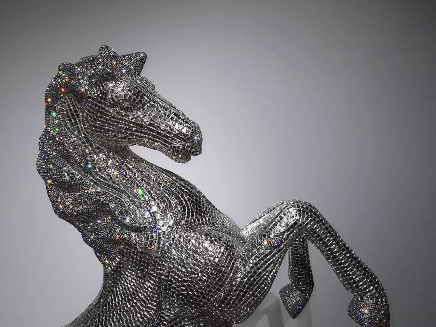 Detailed view of AZAR crystal horse head highlighting precision-cut crystal placement