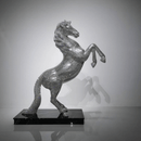 Front view of AZAR crystal stallion sculpture showing dramatic rearing posture and crystal brilliance