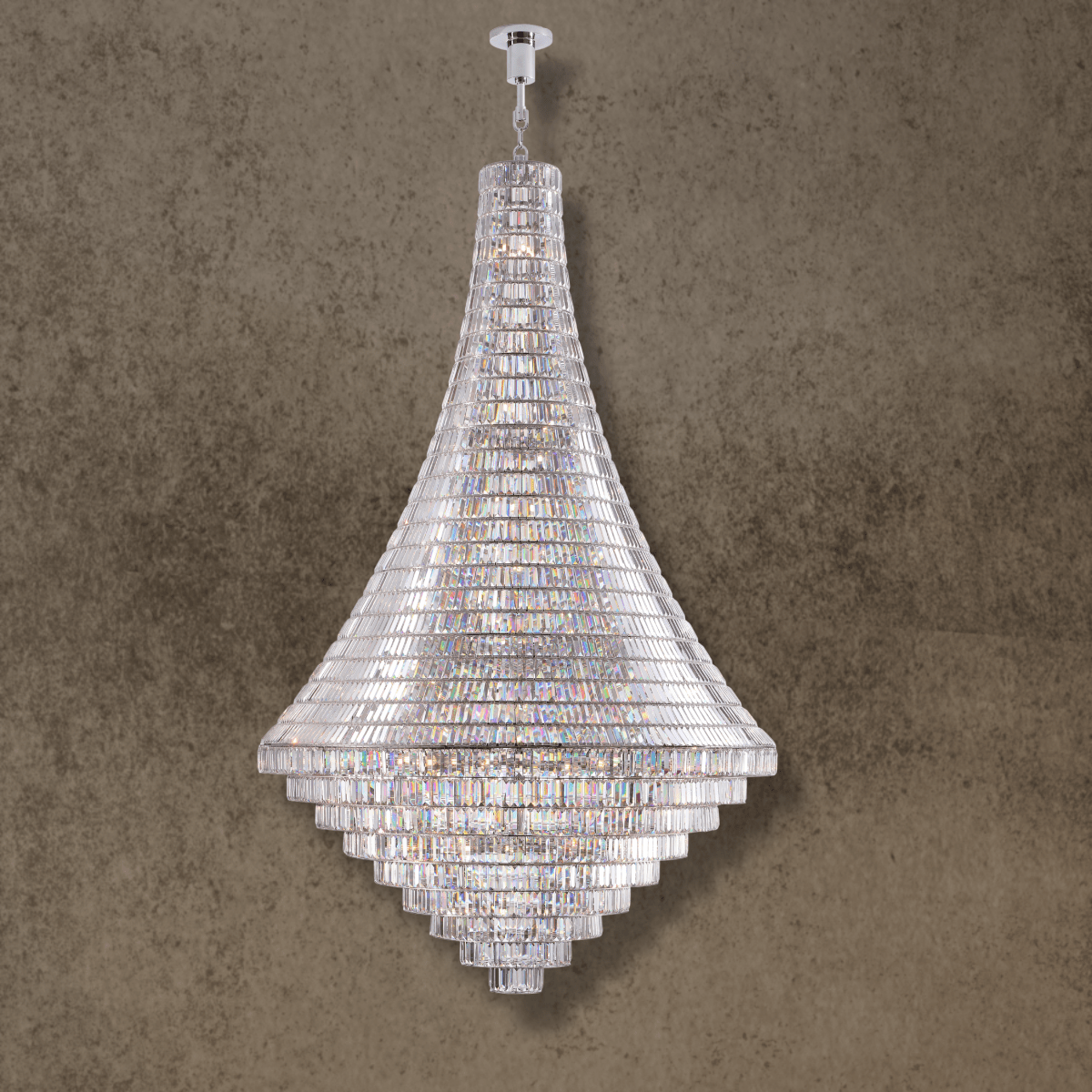 Bel Air monumental Asfour crystal chandelier in polished stainless steel, front view on a textured taupe background.