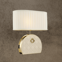 Bellmont luxury table lamp featuring a quilted leather base, polished copper frame, and ivory fabric shade.