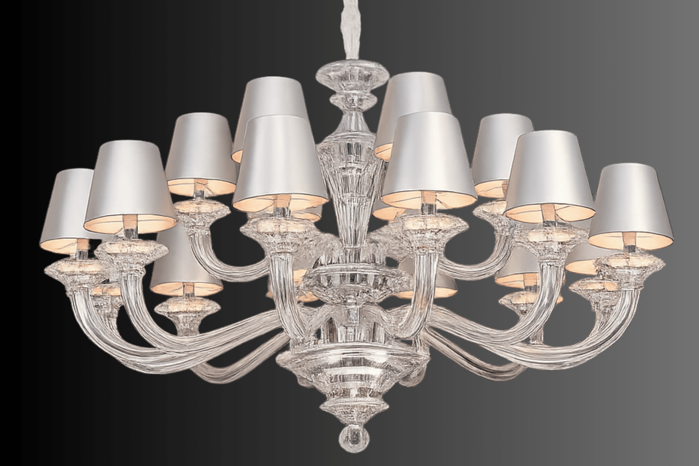 Close-up of Cadogan chandelier showing optical crystal arms and tailored ivory fabric shades