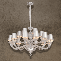 Cadogan luxury crystal chandelier with ivory shades in a refined London-inspired interior setting