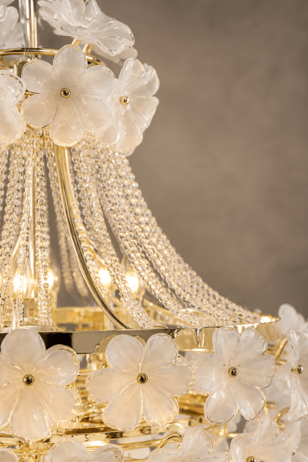 Camellia Bloom Chandelier diameter 70cm close up shot showing the glass and crystal parts with light grey background.