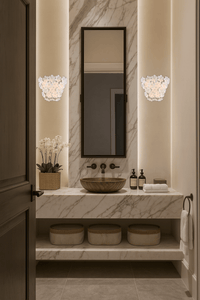 Murano-style floral wall sconces installed beside a bathroom mirror in a luxury interior.