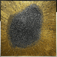Close-up of DIBA showing dense Swarovski crystals and gold-plated radiating structure