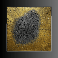Framed DIBA crystal wall art with gold rays and 12,000 Swarovski crystals on dark background