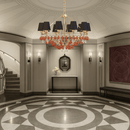 Donatello Eleganza gold chandelier with black shades and Murano-style glass displayed in a luxury foyer interior setting.