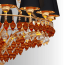 Close up of Donatello Grande, showcasing Murano style glass and gold plated metalwork.