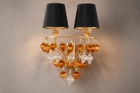 Close-up of Donatello Regal Glow wall lamp with black shades, gold metalwork and sculpted glass drops