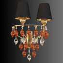 Gold wall sconce with black fabric shades and hand-blown Murano-style glass detailing shown against a dark backdrop.