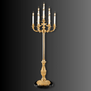 Luxury gold French Empire candélabre floor lamp with seven candle lights on dark studio background
