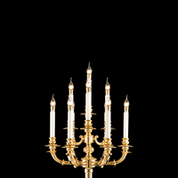 Detailed view of seven-arm French Empire candélabre in polished 24K gold-plated copper