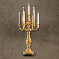 French Empire candélabre table lamp in 24K gold-plated copper with seven candle-style lights, front view
