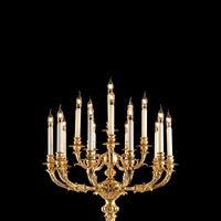 Close-up of ornate French Empire candle arms in 24K gold-plated copper with 16-light configuration