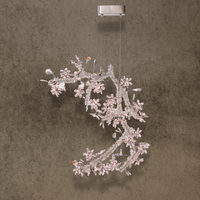 Flora Lumina crystal blossom pendant light with sculptural floral branches and luxury designer lighting form