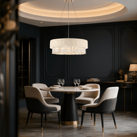 Florence Trapunto Avorio chandelier illuminating a luxury dining room with quilted leather texture and refined Asfour crystal glow.