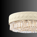 Close-up of the Florence Trapunto Avorio chandelier showing quilted Italian leather craftsmanship and premium Asfour crystal prisms.