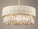 Close up shot of the Florence Trapunto Lucea pendant with ivory quilted leather and clear crystal prisms