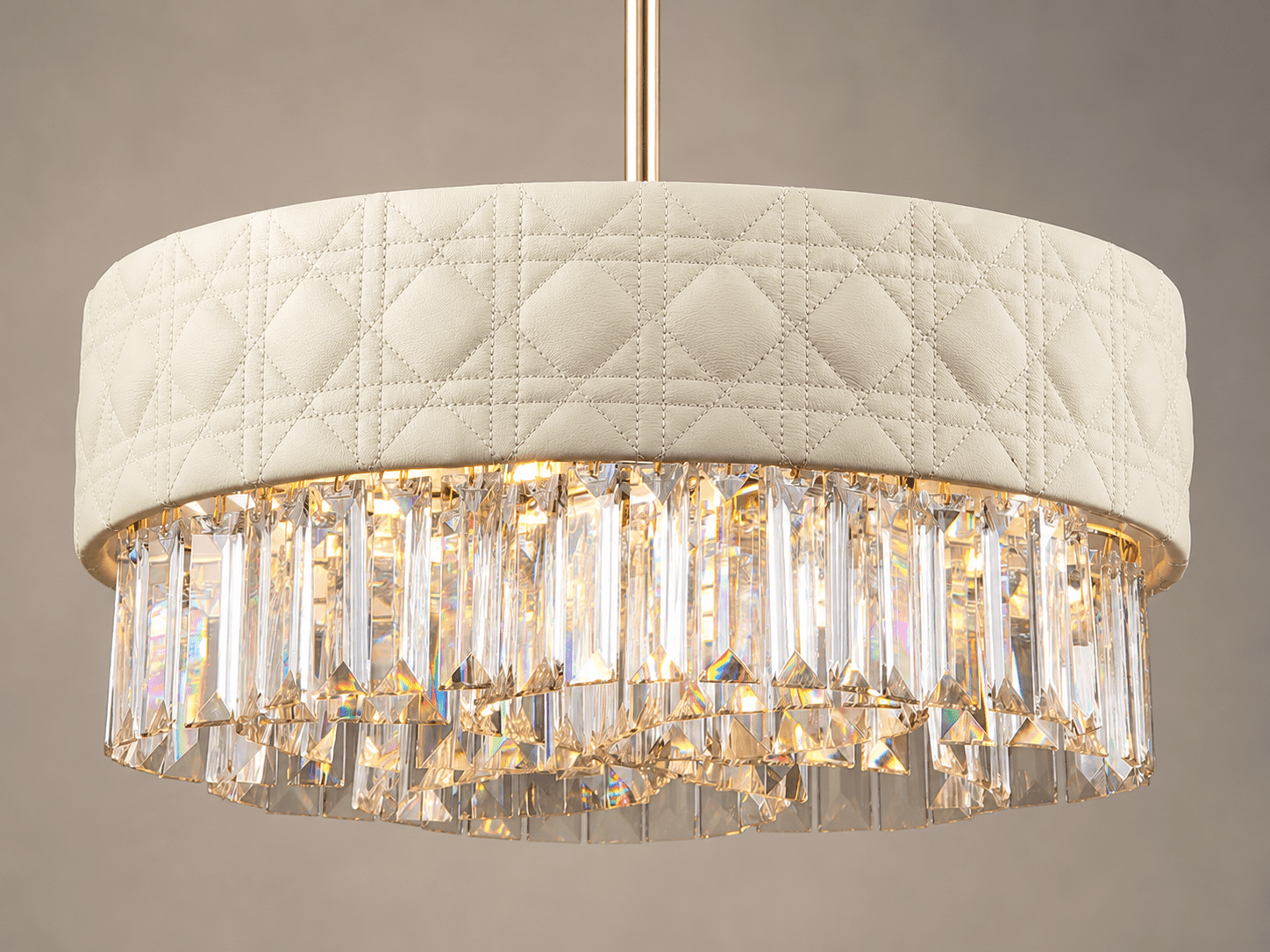 Close up shot of the Florence Trapunto Lucea pendant with ivory quilted leather and clear crystal prisms
