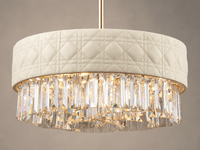 Close up shot of the Florence Trapunto Lucea pendant with ivory quilted leather and clear crystal prisms