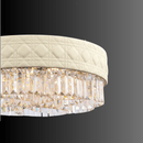 Close-up of Florence Trapunto Neve chandelier showing Asfour crystals and quilted leather band.