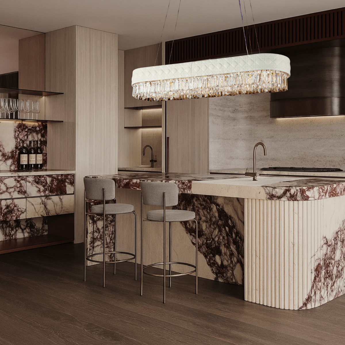 Florence Trapunto Neve chandelier above marble kitchen island in luxury contemporary interior.