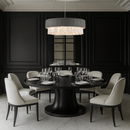 Florence Trapunto Salvia chandelier above dining table in dark luxury interior by HDLS Lighting.