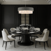 Florence Trapunto Salvia chandelier above dining table in dark luxury interior by HDLS Lighting.
