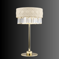 Side view of Florence Trapunto Thalia luxury table lamp featuring quilted leather shade, gold finish, and crystal detailing.