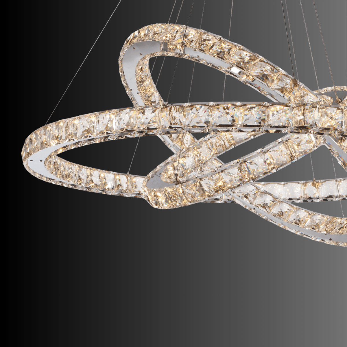Close-up view of A+ grade lead-free crystals on the Halo Luxe Celestia chandelier showing LED light refraction.