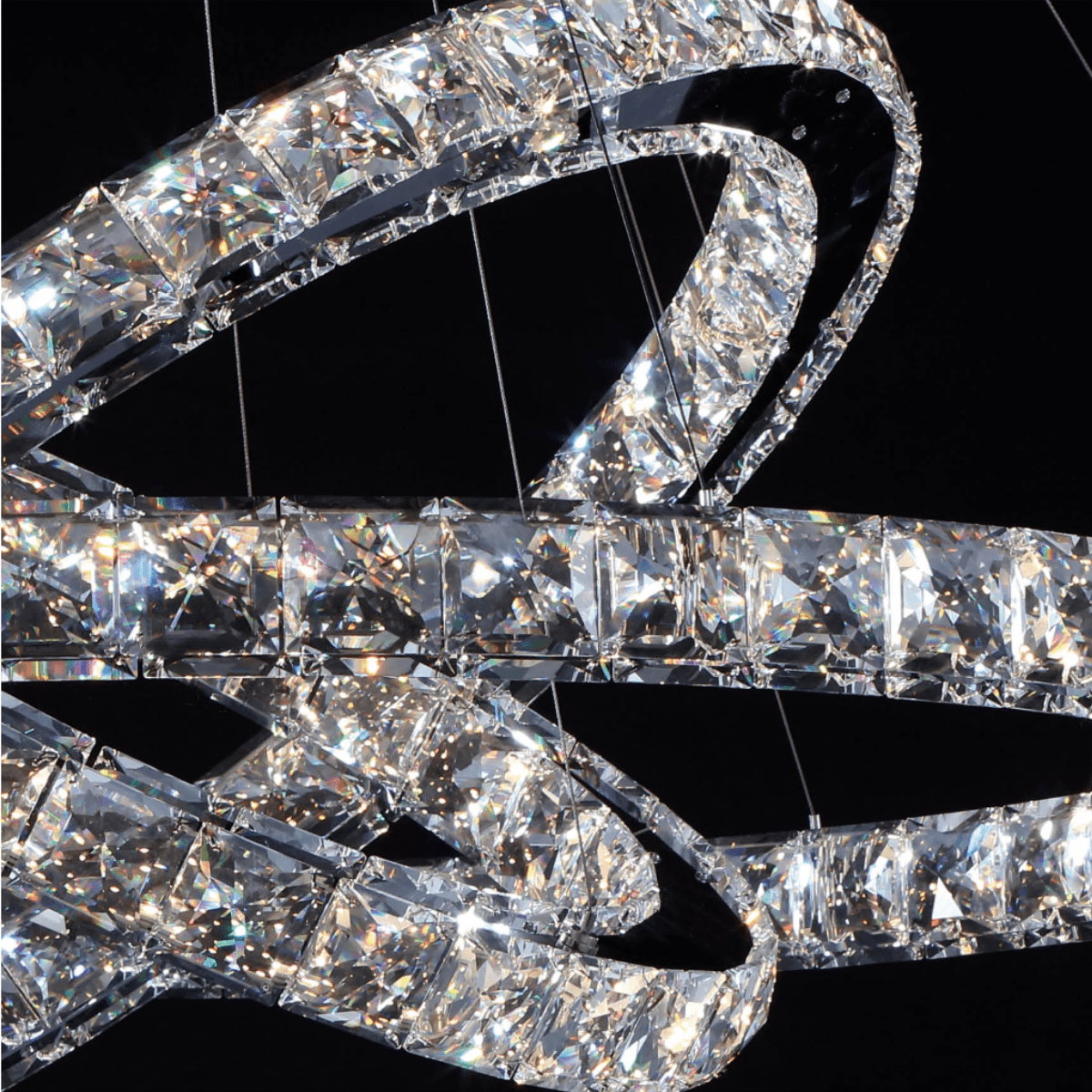 Close-up view of A+ grade lead-free crystals on the Halo Luxe Celestia chandelier showing faceted texture.