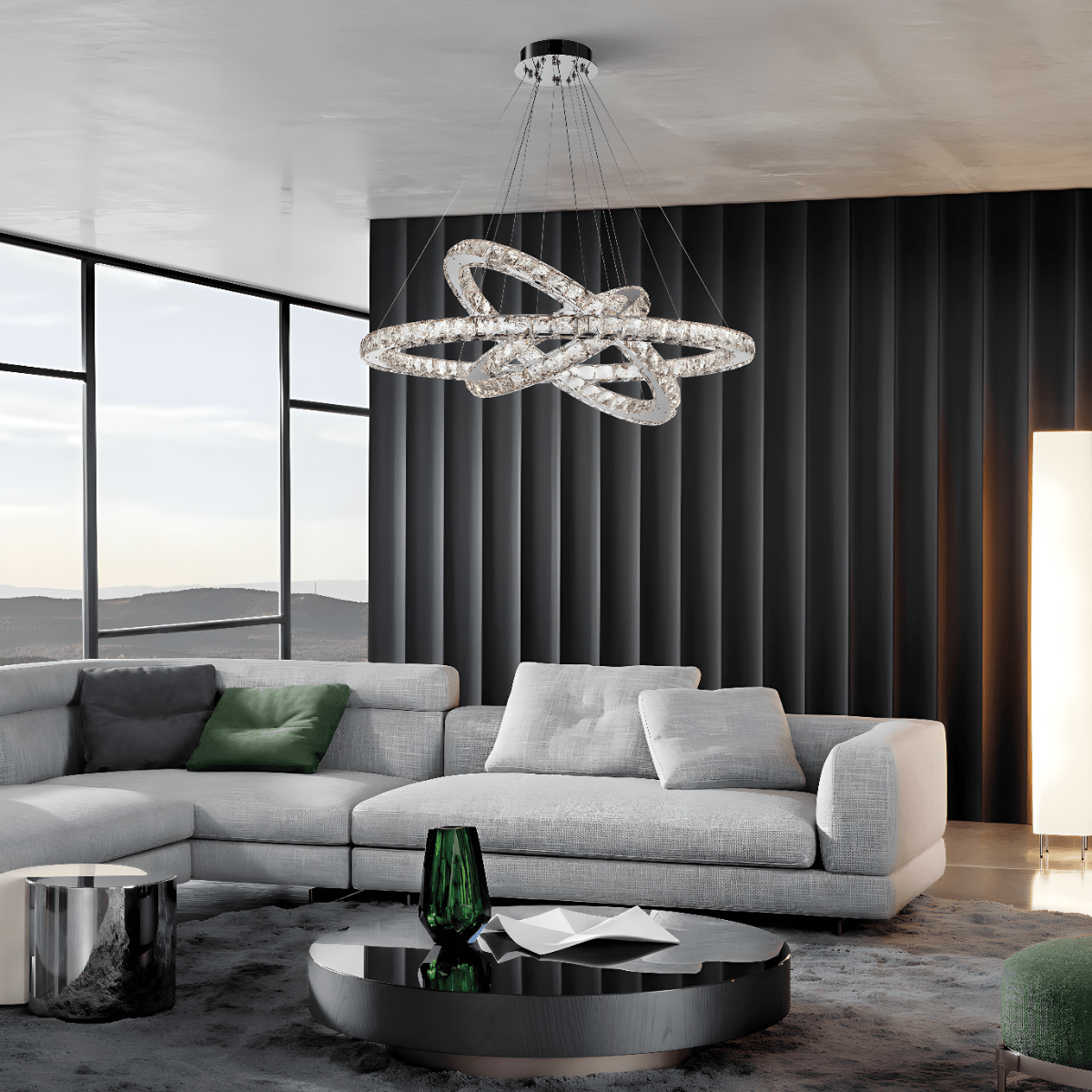 Halo Luxe Astraea crystal chandelier installed in a modern grey living room, showcasing its floating multi-ring LED design.