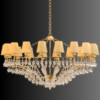 Gold chandelier with Murano Style glass accents on a dark background by HDLS Lighting Ltd