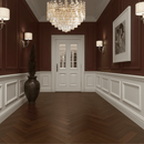 Maurice Doré gold crystal chandelier installed in a refined hallway with panelled walls, adding warm ambient luxury lighting.