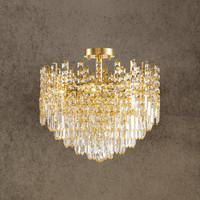Maurice Doré gold crystal chandelier by HDLS, featuring layered Asfour crystals and polished gold finish in a semi-flush design.