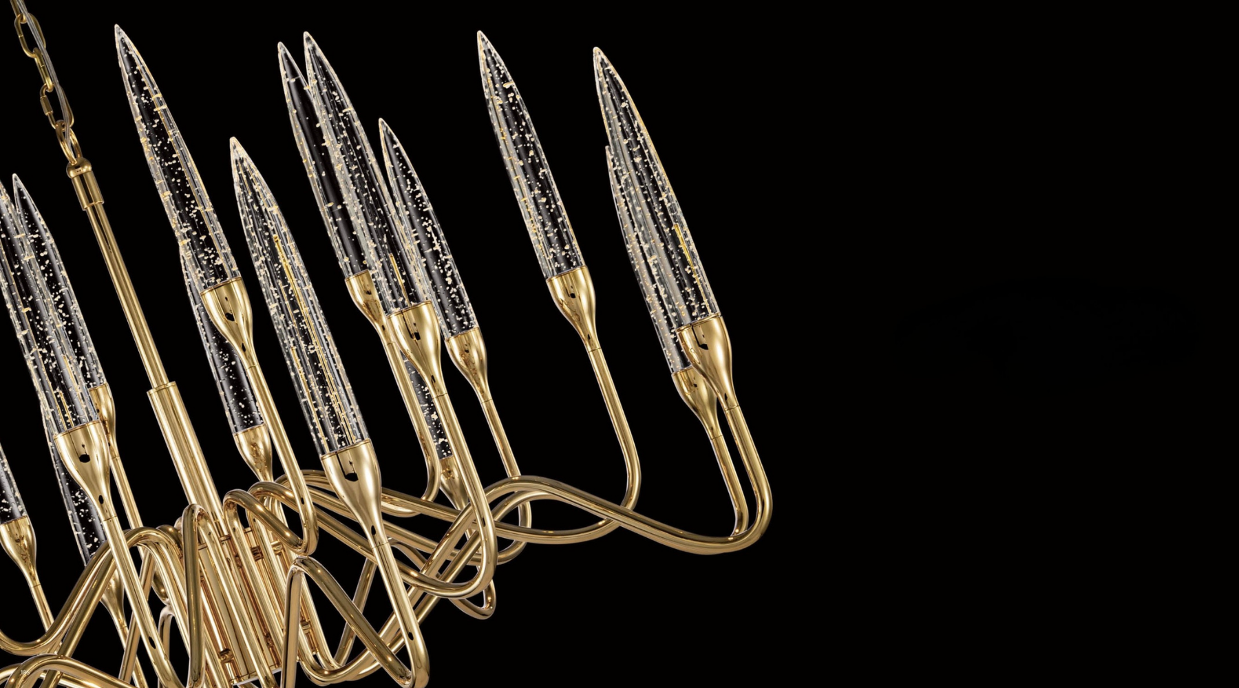 Detail of a gold-finished crystal chandelier by HDLS, illustrating precision craftsmanship within an architectural lighting specification process.