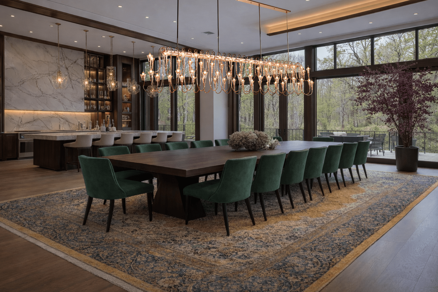 Hyperion Lumina linear brass and crystal chandelier installed above a long dining table in a luxury dining room.
