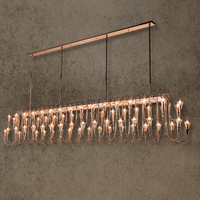 Large linear brass and crystal chandelier for long dining tables, Hyperion Lumina designer chandelier by HDLS.