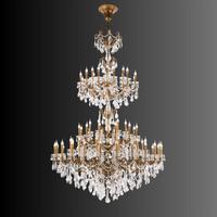 Full view of the Imperial Grace Éclat chandelier, featuring bronze arms and  Asfour crystals with a dark gradient background.