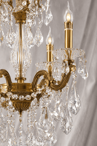 Close up shot of the crystal and bronze parts of the Imperial Grace Petite chandelier by HDLS Lighting