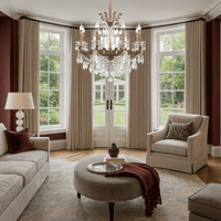 Petite chandelier installed in a classic living room with large windows and drapery.
