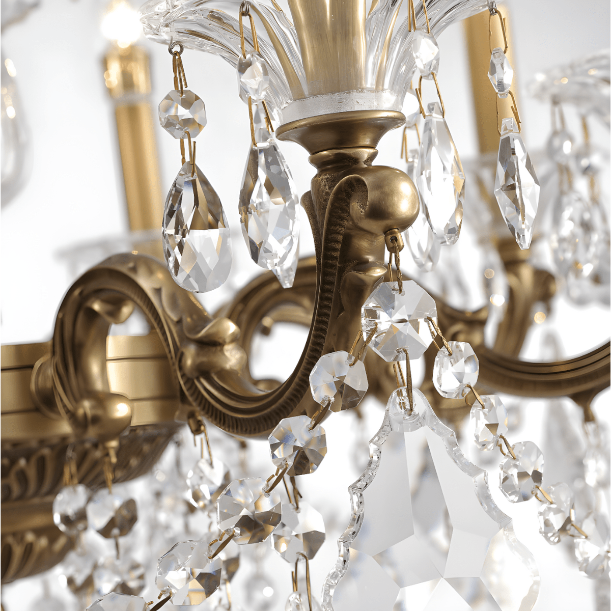 Detail of Regina chandelier with precision-cut Asfour crystals and bronze scrollwork.