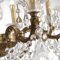 Detail of Regina chandelier with precision-cut Asfour crystals and bronze scrollwork.