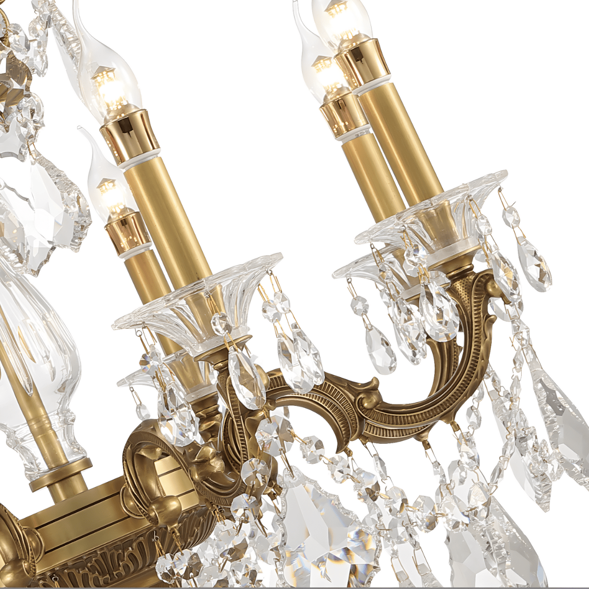 Close-up of Regina chandelier showing bronze arm detailing and crystal arrangement.