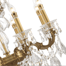 Close-up of Regina chandelier showing bronze arm detailing and crystal arrangement.